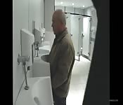 Hidden camera caughts old dude pissing