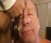 Cocksucker Stewart takes cum facial